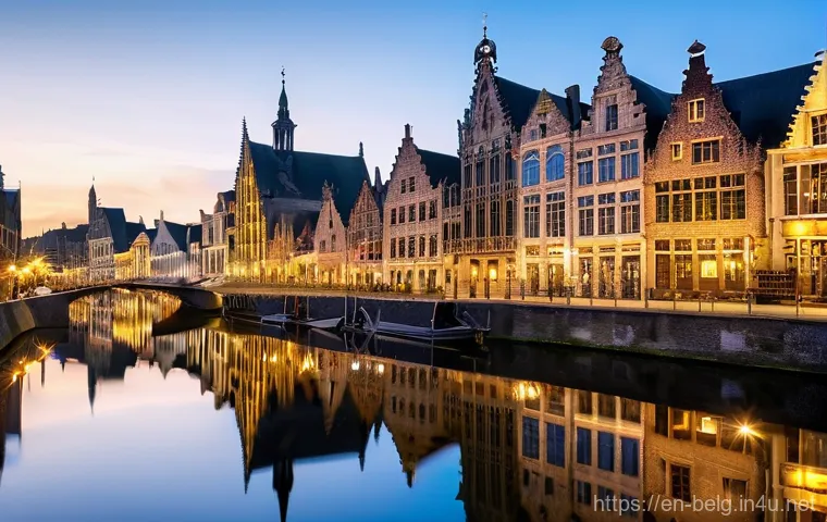 벨기에 야경 명소 - **Ghent's Golden Reflections on the Lys River**
    "A stunning evening view of Ghent's historic Gra...