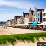 Home 23 벨기에 해안 지역 - A serene coastal village scene in Belgium during a sunny late spring afternoon, featuring wide sandy...